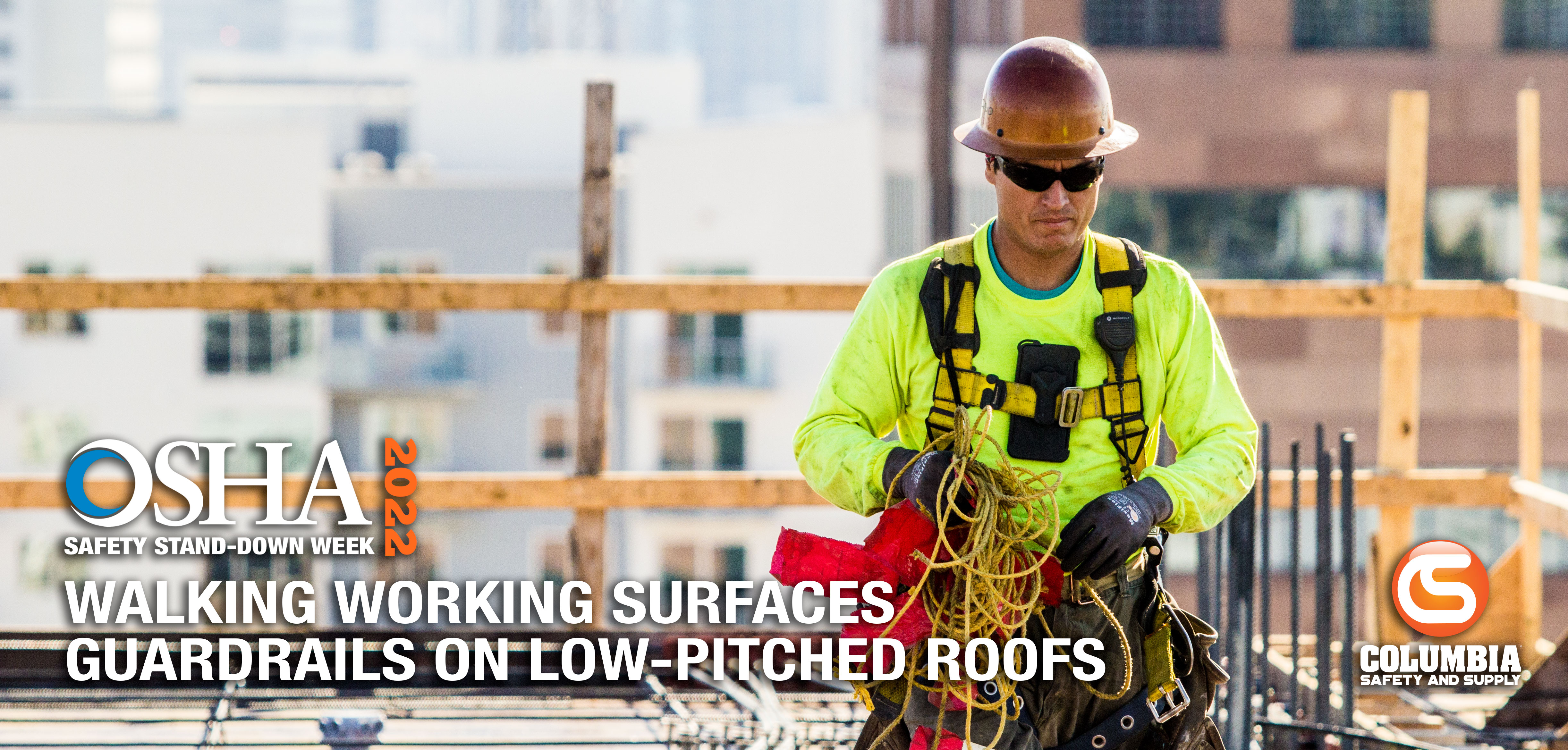 Image of a person on a rooftop with guardrails